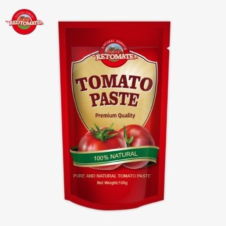 کیسه ایستاده 100 گرم حاوی خمیر گوجه فرنگی دو برابر متمرکز با خلوص بین 30٪ تا 100٪ است